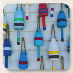 Maine, Stonington, decorative lobster buoys Coaster