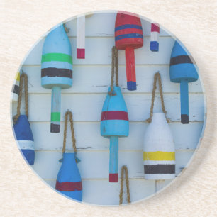 Maine, Stonington, decorative lobster buoys Coaster