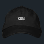 Majestic Black Hat with Prominent King Embroidery<br><div class="desc">Command attention with the black adjustable cap that features prominent "King" embroidery. Crafted from cotton for comfort,  this cap includes an adjustable visor for a perfect fit. A stylish choice for adding elegance to your look.</div>
