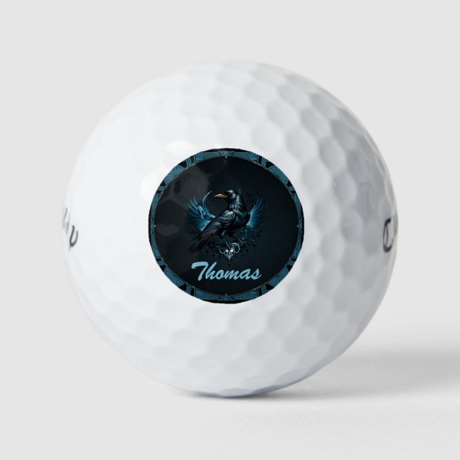 Majestic black raven sitting on an ornate golf balls (Front)