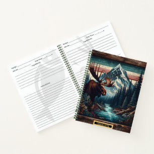 Majestic moose by a serene mountain river at dawn notebook