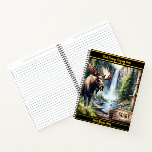 Majestic moose by the waterfall in a serene forest notebook