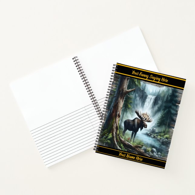 Majestic moose standing near a tranquil waterfall notebook (Inside)