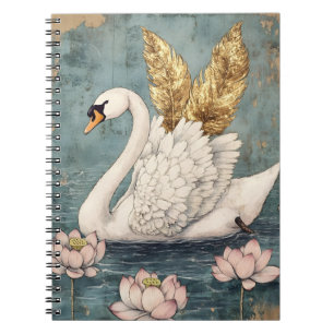 majestic swan with golden wings floats on the wate notebook