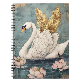 majestic swan with golden wings floats on the wate notebook