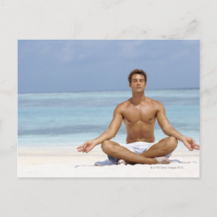 Maldives, Handsome young man meditating in a Postcard