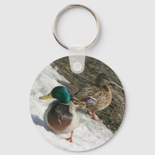 male and female mallards on snow keychain