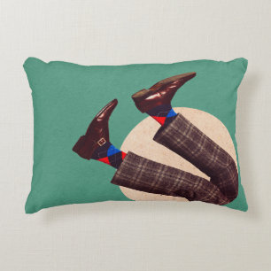 Male legs stacking in round on pastel geometrical decorative cushion