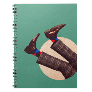 Male legs stacking in round on pastel geometrical notebook