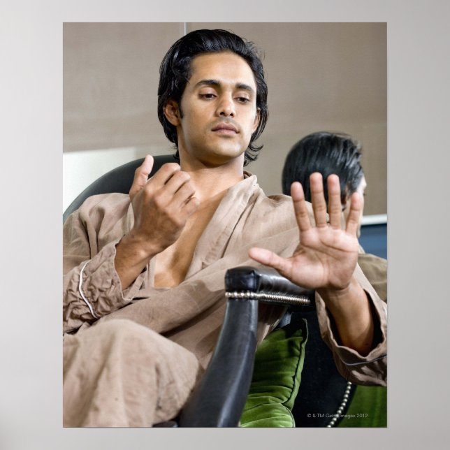Man admiring his manicure poster (Front)