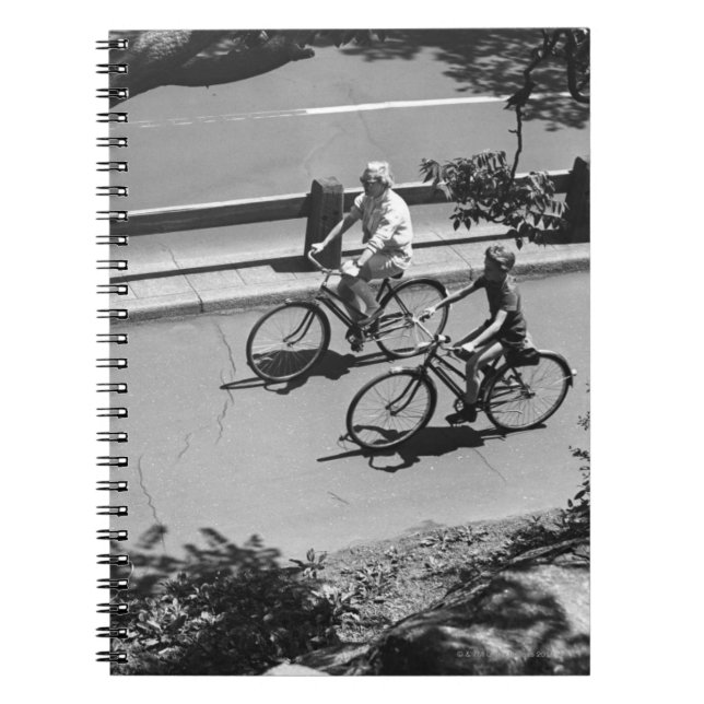 Man and Boy Cycling Spiral Notebook (Front)