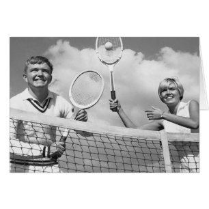 Man and Woman Playing Tennis
