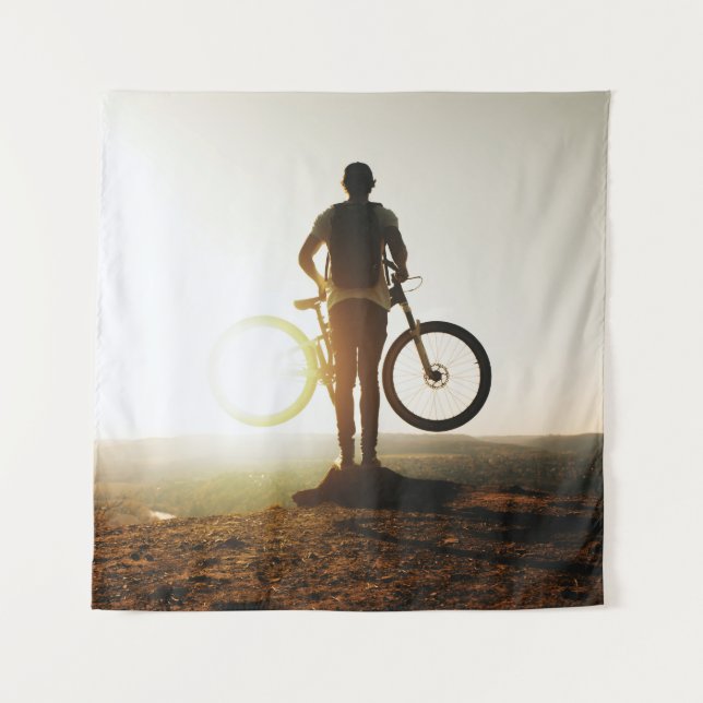 Man carrying bike tapestry (Front)