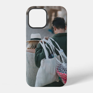 Man carrying white bags iPhone 12 case