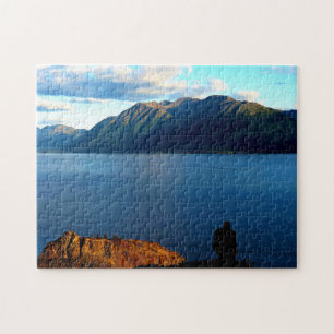 Man Crouches Contemplating Sunset Light in Alaska Jigsaw Puzzle