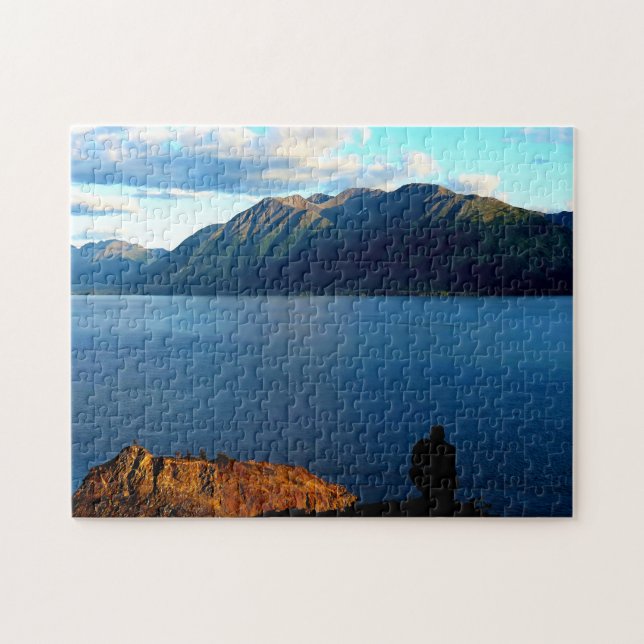 Man Crouches Contemplating Sunset Light in Alaska Jigsaw Puzzle (Horizontal)
