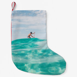 Man doing surfing small christmas stocking