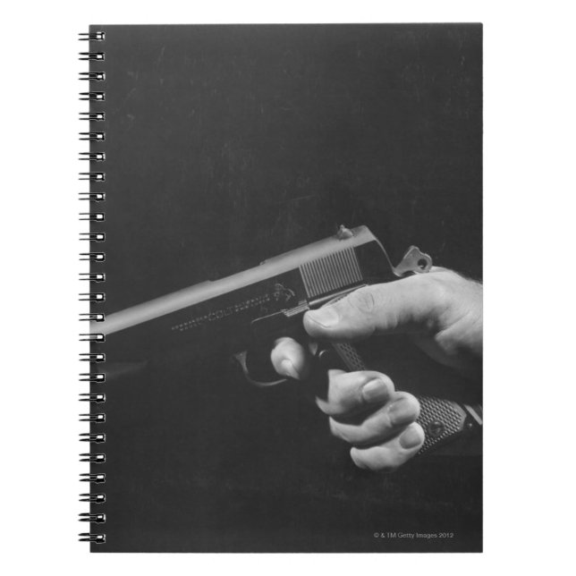 Man Holding Gun Spiral Notebook (Front)