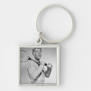Man Holding Tennis Racket Key Ring