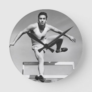 Man Hurdling Round Clock