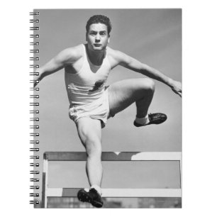 Man Hurdling Spiral Notebook