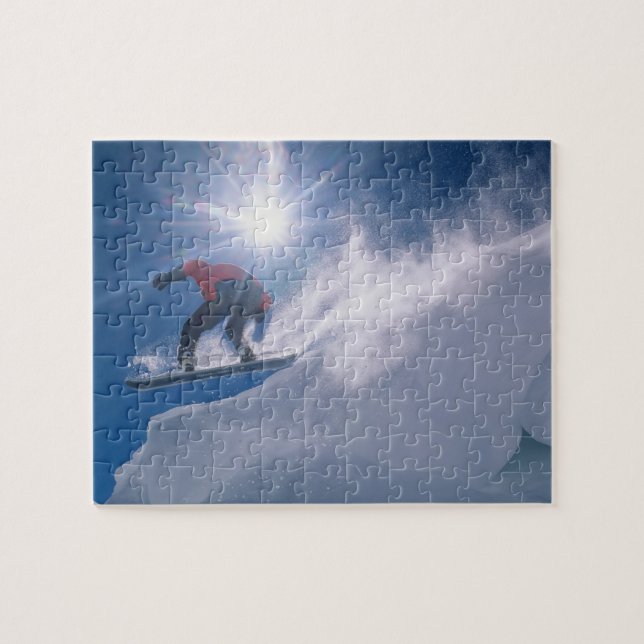 Man jumping off a large cornince on a snowboard jigsaw puzzle (Horizontal)