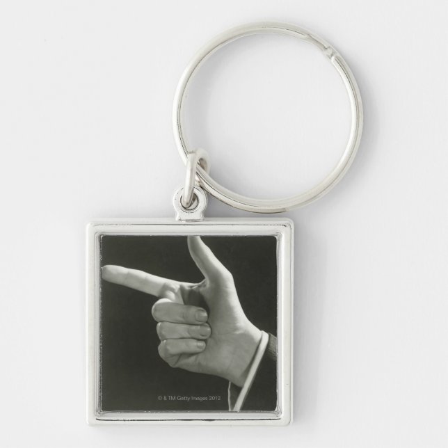 Man Pointing Key Ring (Front)