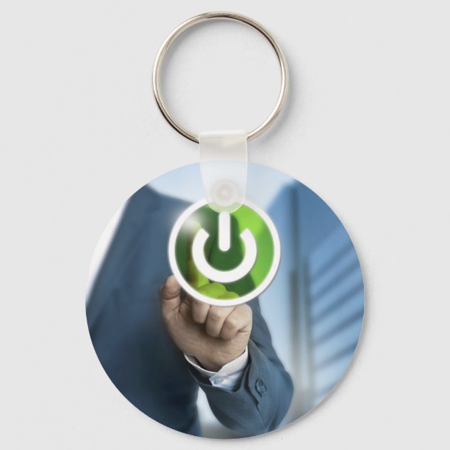 Man pushes power button concept background key ring (Front)