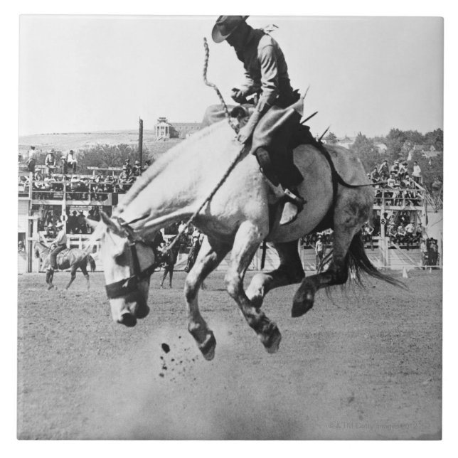 Man riding bucking horse in rodeo tile (Front)