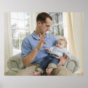 Man signing the word 'B' in American sign
