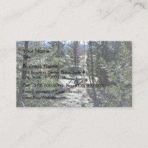Man sitting on a log in a forest business card