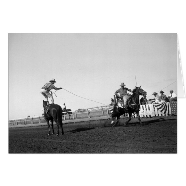 Man standing on a horse roping a horse and rider (Front Horizontal)