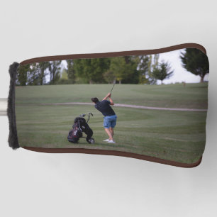 Man swinging a Golf club Putter Golf Head Cover