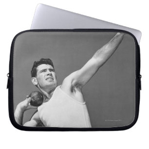 Man Throwing Shotput Laptop Sleeve