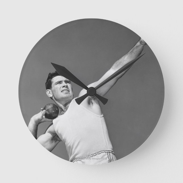 Man Throwing Shotput Round Clock (Front)
