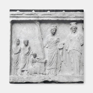 Man, woman and child before an altar magnet