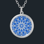 Mandala in blue Necklace<br><div class="desc">While the mandala originated in India,  today the beauty of the modernized mandalas are suitable for many items in the home,  as well as for decorations on clothing. 

Note: there are a variety of products with this design suitable for your home or function,  & mandalas in other colors.</div>
