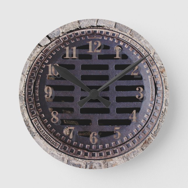 Manhole cover and cobblestone road clock (Front)