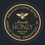 Manuka Honey Black Metallic Gold Vintage Bee Classic Round Sticker<br><div class="desc">"Honey" in a chiseled metallic gold font. Updated vintage honeybee illustration on a black background. Larger text size for apiary name and location,  in brighter pale gold colour. Common honey net weight conversions: 8oz (227g),  12oz (340g),  16oz (454g),  32oz (907g),  5lb (2.27kg).</div>