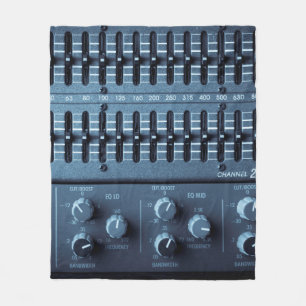 Many buttons on a sound mixer in a recording studi fleece blanket