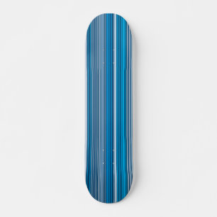 Many multi coloured stripes in the blue... skateboard