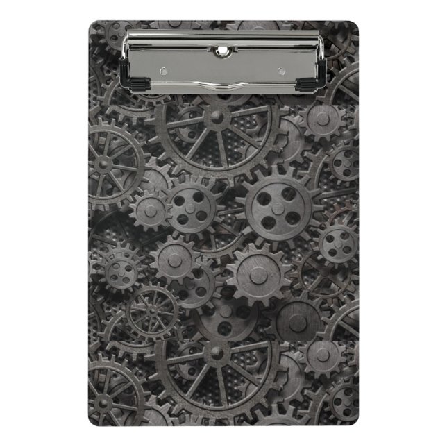 Many old rusty metal gears or machine parts mini clipboard (Front)
