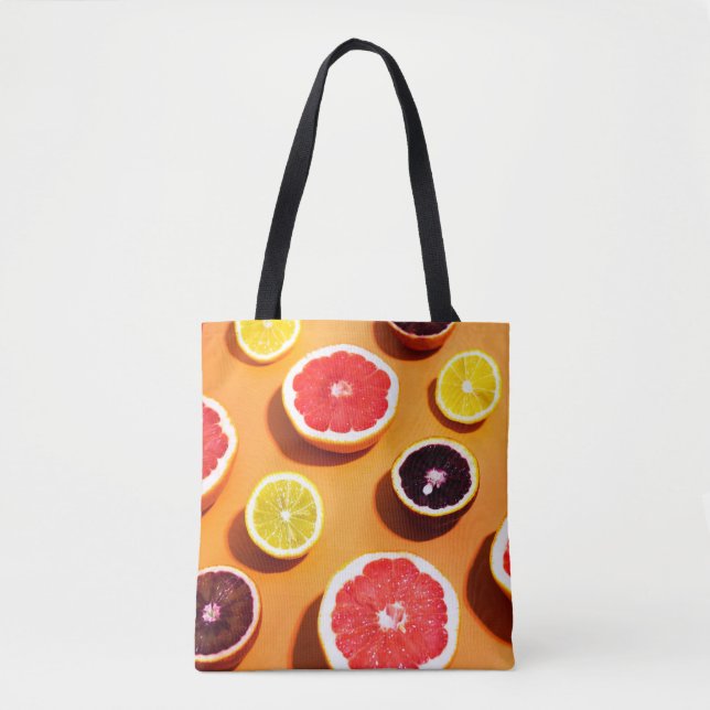 Many variety citrus fruits pattern in sunlight on  tote bag (Front)