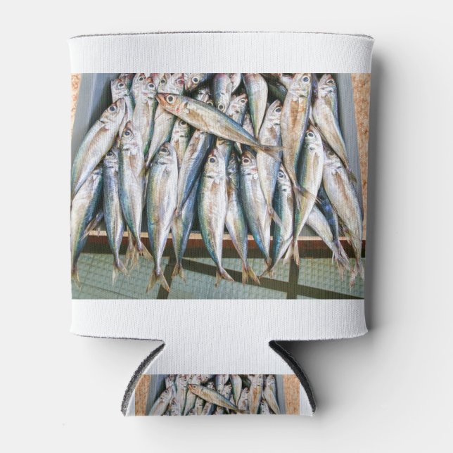 Many whole anchovies lying side by side in crate can cooler (Front)