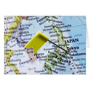 Map pin placed in Tokyo, Japan on map, close-up