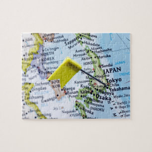 Map pin placed in Tokyo, Japan on map, close-up Jigsaw Puzzle