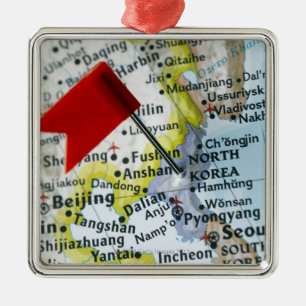 Map pin placed on North Korea on map, close-up Metal Tree Decoration