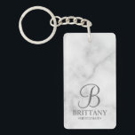 Marble Personalised Bridesmaid's Name and Monogram Key Ring<br><div class="desc">Elegant Black and White Personalised Bridesmaid Gifts featuring personalised monogram in grey elegant script font style with bridesmaid's name and title in classic serif font style on white marble background. Also perfect for groomsmen, best man, father of the bride, maid of honour, flower girl, mother of the bride and more....</div>