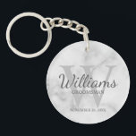 Marble Personalised Script Groomsmen  Key Ring<br><div class="desc">Add a personal touch to your wedding with personalised groomsmen keychain. This keychain features personalised groomsman's name in grey classic script font style with wedding details in grey classic serif font style and monogram in light grey classic serif font style as background, on white marble background. Also perfect for best...</div>