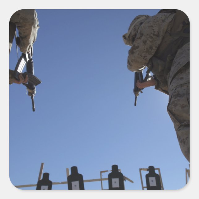 Marines change magazines in the midst of firing square sticker (Front)